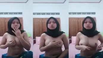 Bokep Jilbab Hitam Cantik Colmek Mendesah